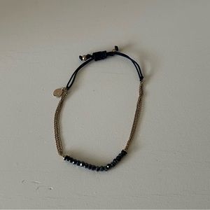 Stella and Dot Black and Gold Adjustable Courage Bracelet